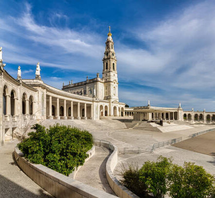 View of the colonnade and Basilica of Our Lady of Fatima Sanctuary  in Cova de Iria, Portugal